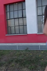 Smashing black-haired queen pisses near busy road