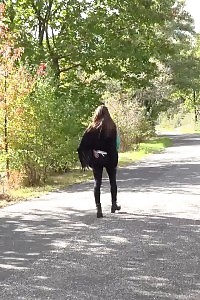 Cynthia Vellons relieves herself in outdoors