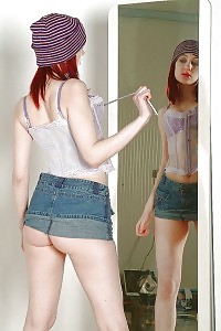 Chloe pulls up her skirt for a great view of her breathtaking panties under her skirt