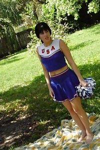 Astonishing cheerleader removes her outfit to flash off her boobies and jerk her hungry vagina