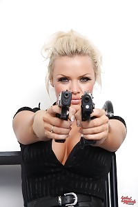 Big-breasted goddess Frankie holding two guns