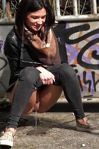 City peeing for seductive black haired chick