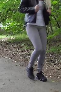 Victoria Pure squats to pee on a path in the city