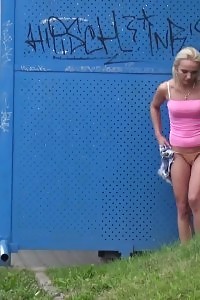 Blonde needs to pee on the train platform