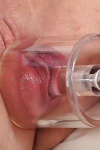 Brilliant dark haired Doroty plugs a big sex toy