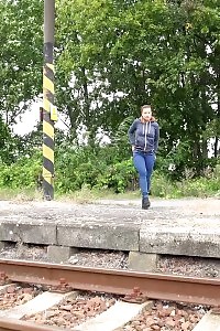 Bootylicious brunette pisses over the train tracks
