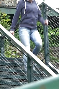 Fascinating brunette pisses near tennis courts