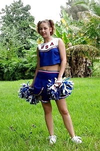 Check out this DIRTY cheerleader as she gets nude in the public and makes her cunt wet