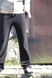 Impressive black-haired filmed twice peeing outside