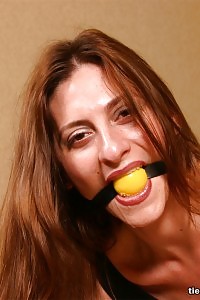 Tied blond can't deny flashing the camera with her wet white panties