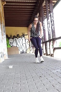 Dark haired lady relieves her pee desperation