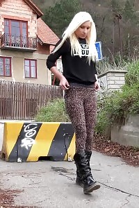 Lovely blonde displays her cunt as she pissing