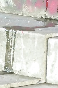 Black haired stunner shows her muff as she pisses