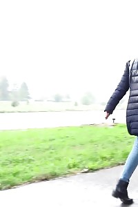 Impressive black haired girl pees on the ground