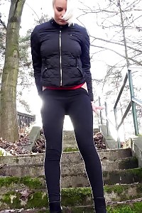 Provocative blonde has a hot pee outside on steps