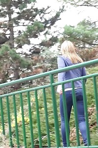 Excellent gal flaunts her pussy as she pissing