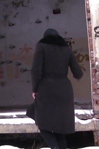 Suburb peeing in the snow for dark haired Dasha