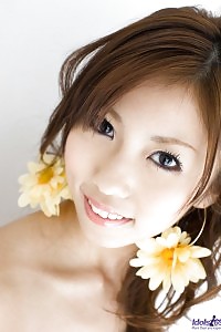 Glamorous Japanese doll has a delicate set of boobies and a appealing face for a collegegirl