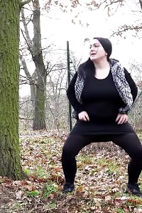 Plumpy doll squats outside to piss outdoor