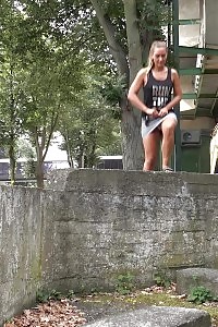 Naomi Benet releases a high arc of pee outdoor