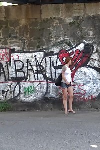 Dazzling ginger squats to pee in woods