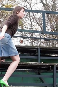 Naughty black-haired sprays her pee outside