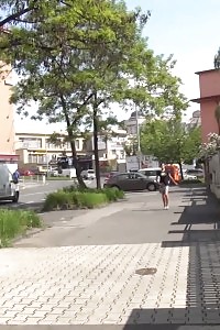Delightful hottie pissing in public on busy road