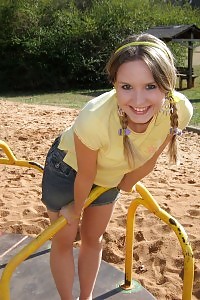 Kitty shows off her young and appealing body as she flashes her panties at the playground