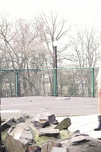 Attractive blonde sprays her pee outside