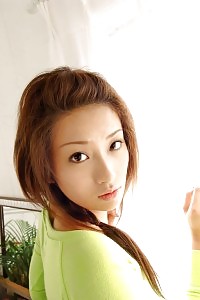 Lovely naughty Asian tart babe demonstrates her smooth round ass up her miniskirt