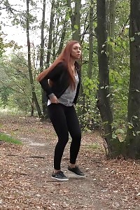 Ginger honey enjoys a hot pee outdoor
