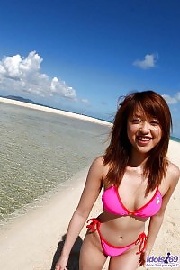 Asian amateur Asuka plays sunbathing and having fun nude on the sandy beach