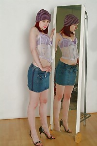 Chloe pulls up her skirt for a great view of her breathtaking panties under her skirt