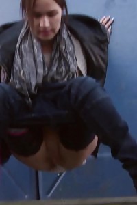 Slender European honey pisses in the middle of city