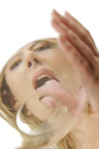 Blonde babe has fun with her golden piss