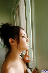 Dirty Asian slave is lathering up her delicious boobs and muff in the shower before party