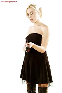 Paige Robins with gun having fun