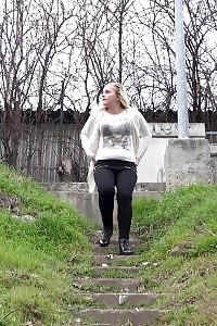 Delightful blonde chick sprays her milks over grass