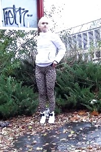 Sensational blonde minx pissing in public near buildings