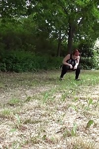 Good-looking ginger pisses next to a busy road