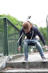 Fascinating brunette pisses near tennis courts