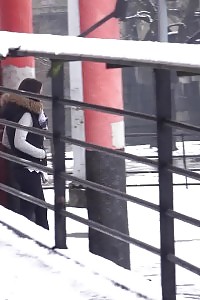 Take a look at the snow melt as this black-haired hottie pees