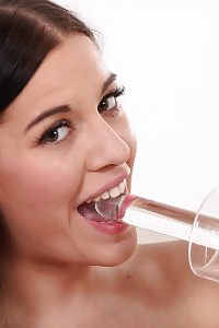 Brilliant dark haired Doroty plugs a big sex toy