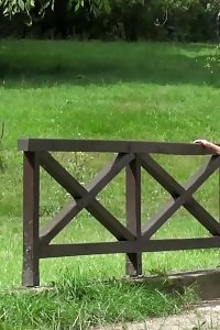 Magnificent ginger lifts up her leg to piss outside