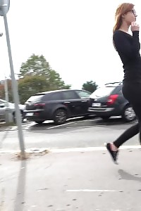 Lovely honey in glasses pisses outside