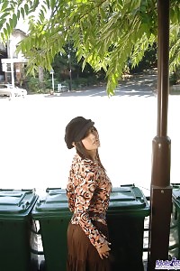 Sweet Asian mistress likes to striptease and flaunt off her charming big jugs and tight butt
