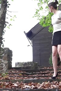 Cutie with hairy snatch pisses down steps