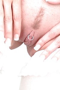 Light-haired in pink flashing off intriguing tits