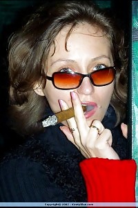 Kirsty Blue smoking hot in her boyshorts and with the cigar in her mouth