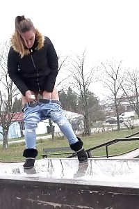 Good-looking chick Naomi Bennet pisses in a puddle